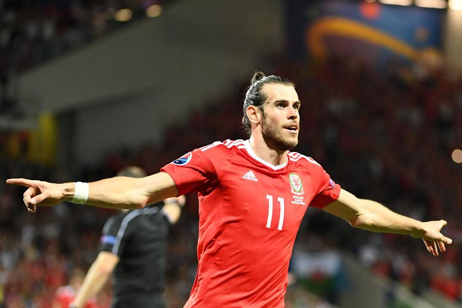 Hajar Rusia, Wales Juara Grup B