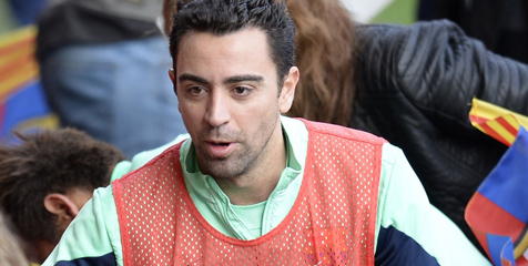 Xavi (c) AFP