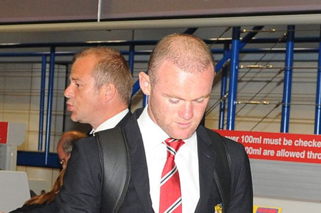 Wayne Rooney sesaat sebelum berangkat ke Bangkok