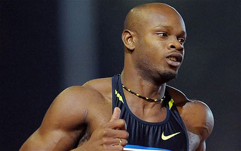 Asafa Powell (c) AFP