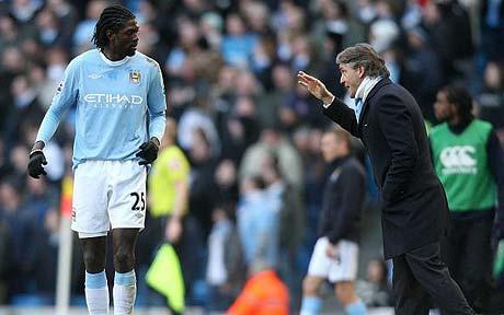 Emmanuel Adebayor dan Roberto Mancini (c) PA