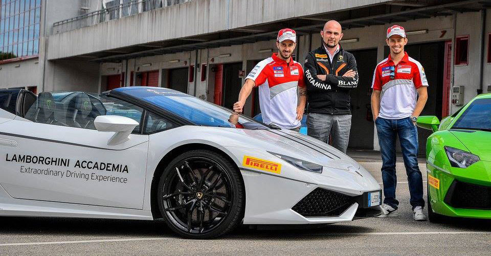 Andrea Dovizioso dan Casey Stoner (c) Lamborghini Squadra Corse