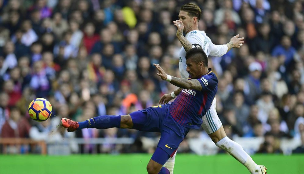 Paulinho vs Sergio Ramos saat El-Clasico antara Real Madrid vs Barcelona.