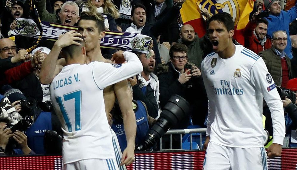 Cristiano Ronaldo, melakukan selebrasi bersama Lucas Vazquez usai mencetak gol ke gawang Juventus pada laga Liga Champions di Stadion Santiago Bernabeu, Rabu (11/4/2018). Real Madrid takluk 1-3 dari Jiventus.