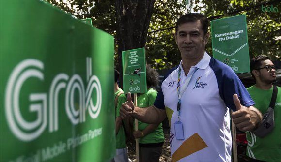 Pevoli legendaris Indonesia, Pascal Wilmar bersiap sebelum membawa obor Asian Games XVIII.