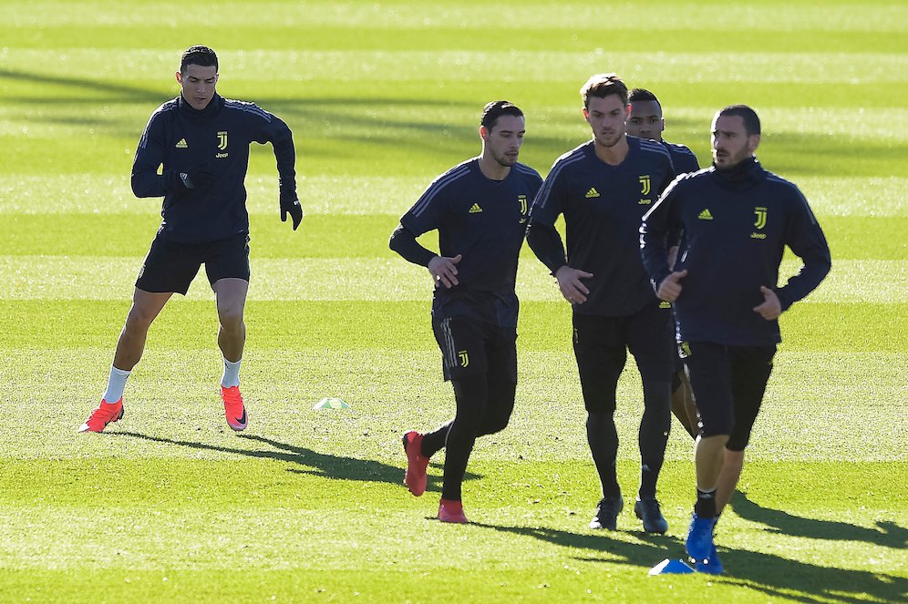 Pemain Juventus berlatih jelang pertandingan melawan Young Boys. (c) AFP