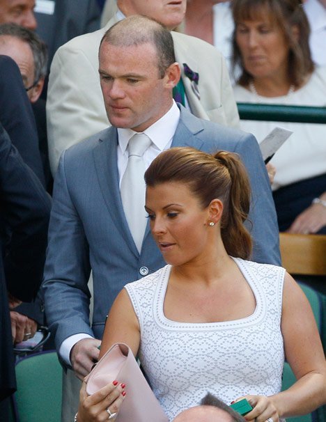 Coleen dan Wayne Rooney menonton All England Lawn Tennis Championships di Wimbledon, London, 9 Juli 2013 silam. (c) AP Photo