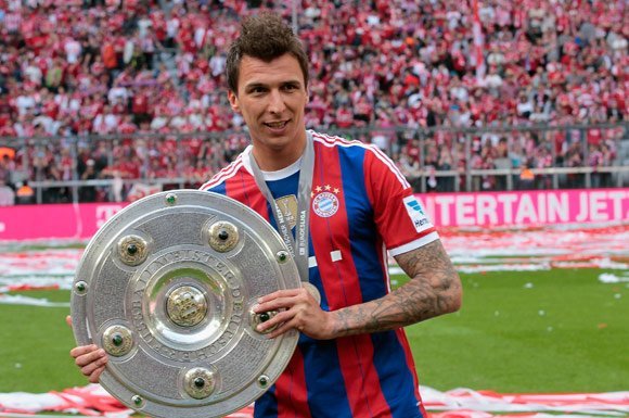 Mario Mandzukic saat memenangi Bundesliga pada musim 2013-2014 bersama Bayern Munchen. (c) DFL