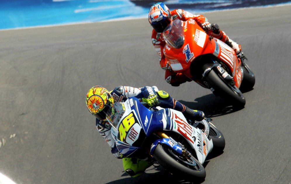 Valentino Rossi dan Casey Stoner (c) MotoGP.com