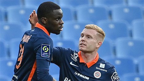 Stephy Mavididi (kiri), merupakan anggota akademi Arsenal selama 8 tahun yang dibuang ke Juventus saat berusia 20 tahun pada 2018. Tidak sukses di Juventus, ia memilih hijrah ke klub Prancis Dijon pada musim 2019/2020. Kini memperkuat Montpellier dan telah mencetak 6 gol. (c) AFP/Pascal Guyot