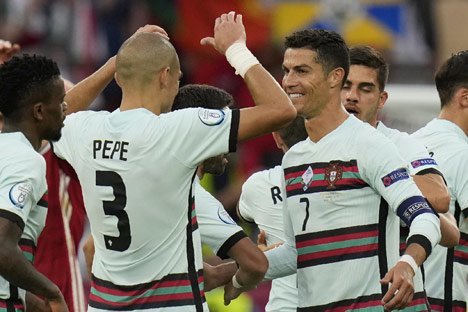 Aksi Cristiano Ronaldo pada laga Hungaria vs Portugal di Grup F Euro 2020 (c) AP Photo