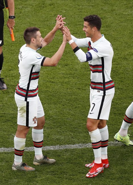 Aksi Cristiano Ronaldo pada laga Hungaria vs Portugal di Grup F Euro 2020 (c) AP Photo