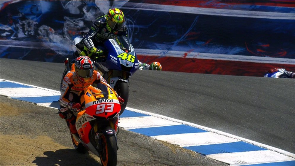 Marc Marquez menyalip Valentino Rossi di MotoGP Laguna Seca 2013. (c) Dorna Sports, Twitter/MotoGP