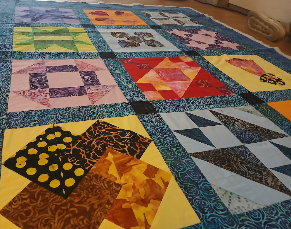 Bedcover dari kain perca hasil karya Bu Wiwik, anggota komunitas Mapa Quilts. (c) Asad Arifin