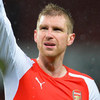 Mertesacker Incar Sukses Ganda Atas MU