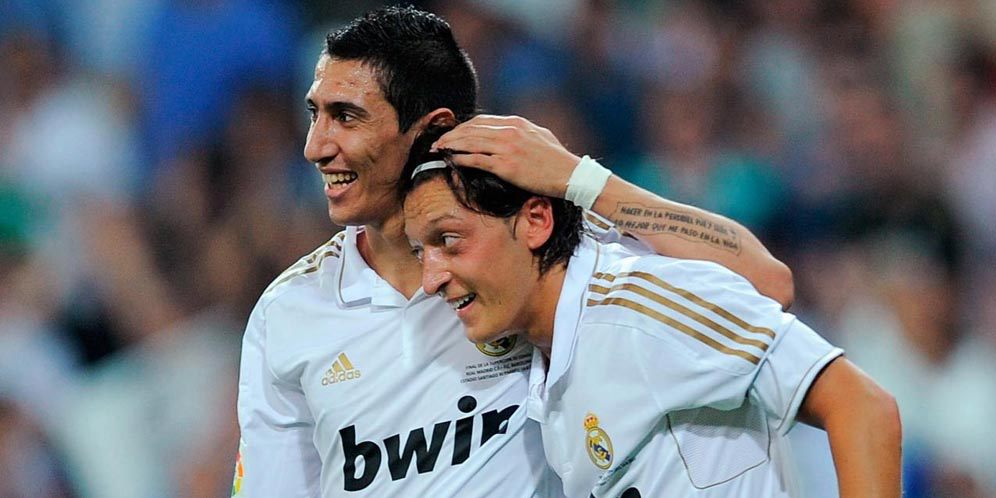 Di Maria dan Mesut Ozil di Real Madrid (c) AFP