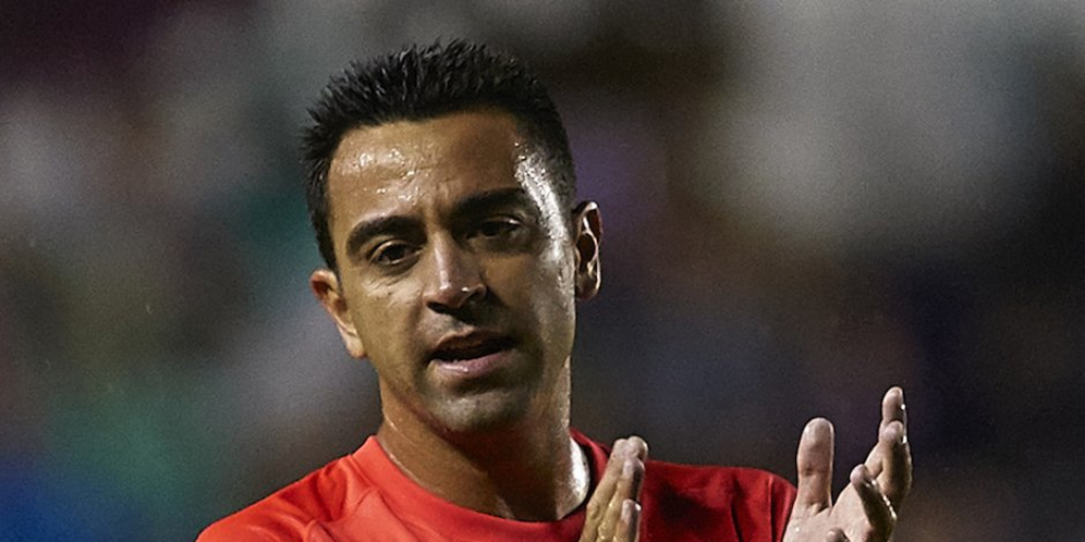 Xavi (c) AFP