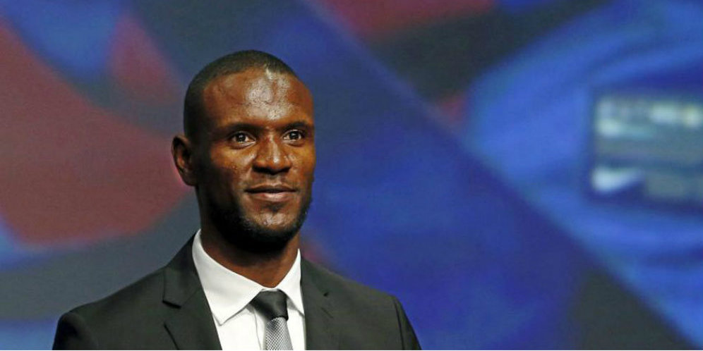 Eric Abidal (c) AFP