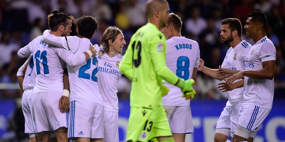 Selebrasi pemain Real Madrid saat lawan Deportivo.