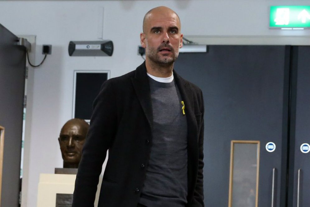 Guardiola Yang Membandel dan Tetap Memakai Pita Kuning