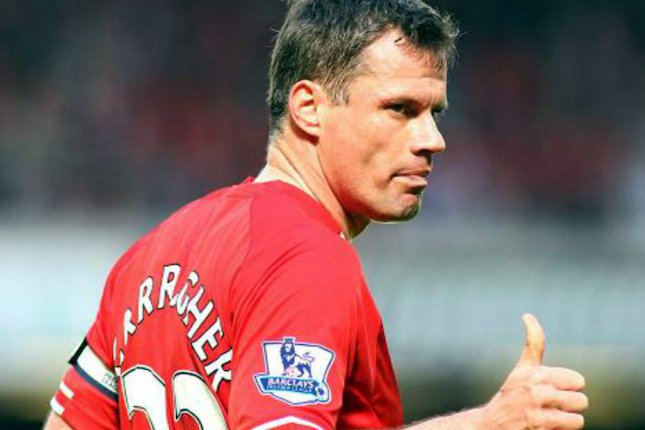 Jamie Carragher saat masih aktif bermain di Liverpool. (c) AFP