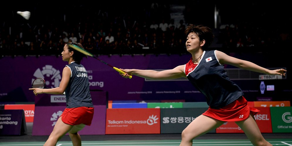 Pebulu tangkis ganda putri Jepang Yuki Fukushima (kiri) dan Sayaka Hirota (kanan) saat lawan Indonesia. (c) Antara/Inasgoc