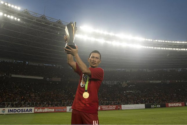 Ismed Sofyan membawa Persija Jakarta juara Liga 1 2018 (c) Bola.com/Vitalis Yogi Trisna