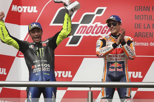 Valentino Rossi dan Marc Marquez (c) AP Photo