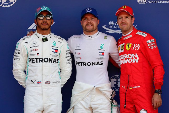 Valtteri Bottas, Lewis Hamilton, dan Sebastian Vettel (c) AP Photo