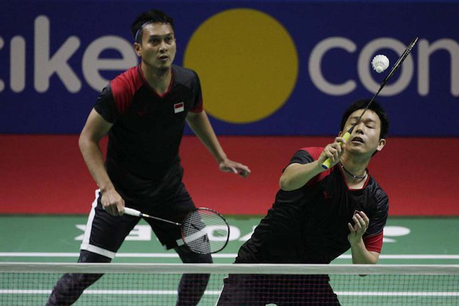 Mohammad Ahsan/Hendra Setiawan lolos ke semifinal Indonesia Open 2019, setelah memenangi pertarungan dramatis kontra ganda Jepang, Hiroyuki Endo/Yuta Watanabe di Istora, Jakarta, Jumat (19/7/2019). (c) Bola.com/Vitalis Yogi Trisna