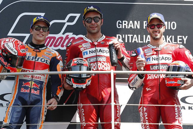 Marc Marquez, Danilo Petrucci, dan Andrea Dovizioso di MotoGP Italia 2019. (c) AP Photo