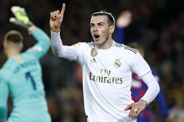 Gareth Bale usai golnya ke gawang  Barcelona dianulir pada laga di Camp Nou, Kamis (19/12/2019) dini hari WIB. (c) AP Photo