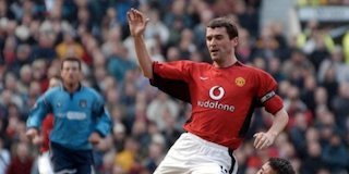 Roy Keane saat masih aktif bermain di Manchester United. (c) AFP