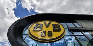 Logo klub Borussia Dortmund. (c) AP Photo