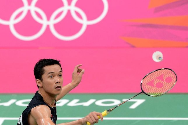 Taufik Hidayat (c) AFP/Adek Berry