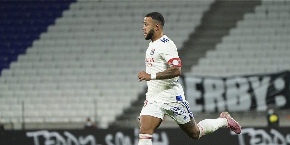 Pemain Lyon Memphis Depay. (c) AP Photo