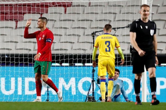 Bintang Portugal, Cristiano Ronaldo merayakan gol ke gawang Andorra, Kamis (12/11/2020) (c) AP Photo