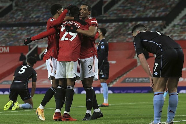 Manchester United merayakan gol yang dicetak Anthony Martial saat menghadapi Aston Villa dalam laga lanjutan Premier League, Sabtu (2/1/2021). (c) AP Photo