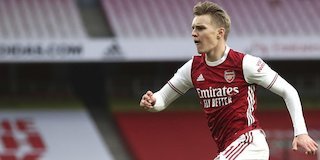 Pemain Arsenal, Martin Odegaard (c) Pool via AP