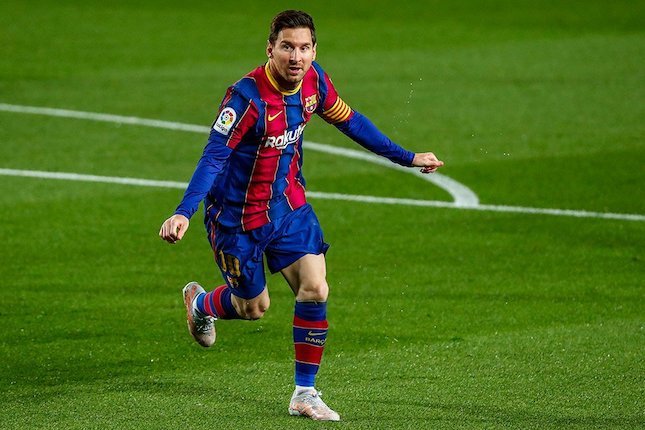 Selebrasi Lionel Messi setelah menjebol gawang Getafe, Jumat (23/4/2021) dini hari WIB. (c) AP Photo