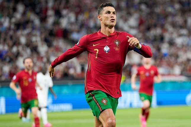 Selebrasi Cristiano Ronaldo usai mencetak gol di laga Portugal vs Prancis, Euro 2020 (c) AP Photo