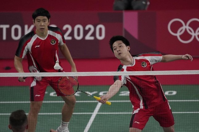 Marcus Fernaldi Gideon/Kevin Sanjaya Sukamuljo di Olimpiade Tokyo 2020. (c) AP Photo