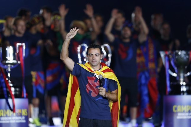 Xavi ketika masih bermain untuk Barcelona (c) AP Photo