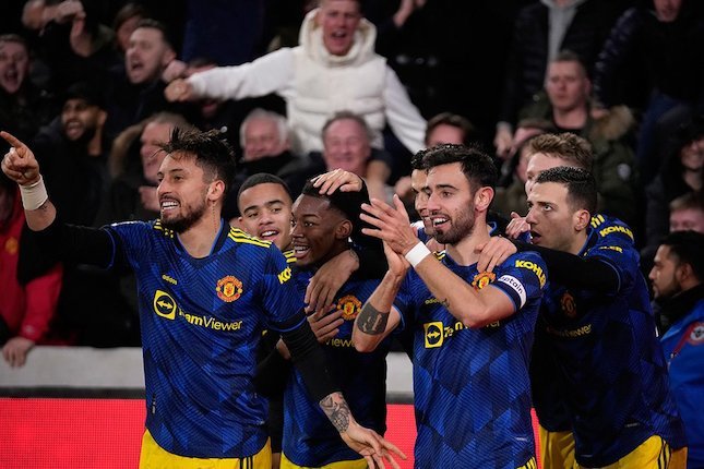 Selebrasi skuad Manchester United untuk gol Anthony Elanga ke gawang Brentford, Premier League 2021/22 (c) AP Photo