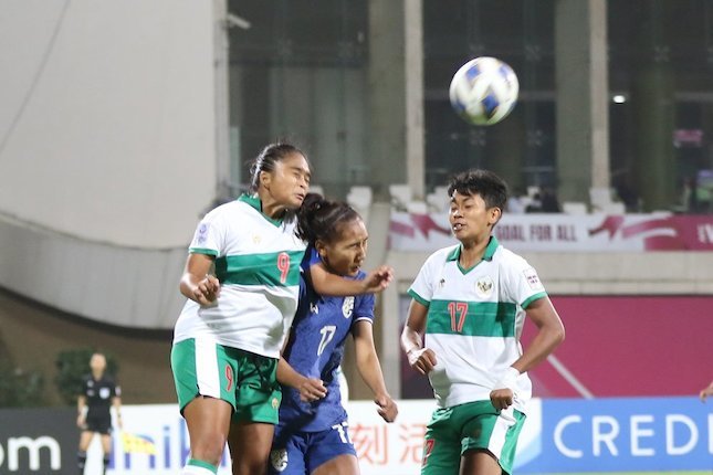 Timnas Wanita Indonesia saat berlaga lawan Thailand di laga matchday 2 Grup B Piala Asia Wanita 2022 di D.Y. Patil Sports Stadium, Navi, Mumbai, India, Senin (24/01/2022) malam WIB. (c) 2022 Asian Football Confederation (AFC)