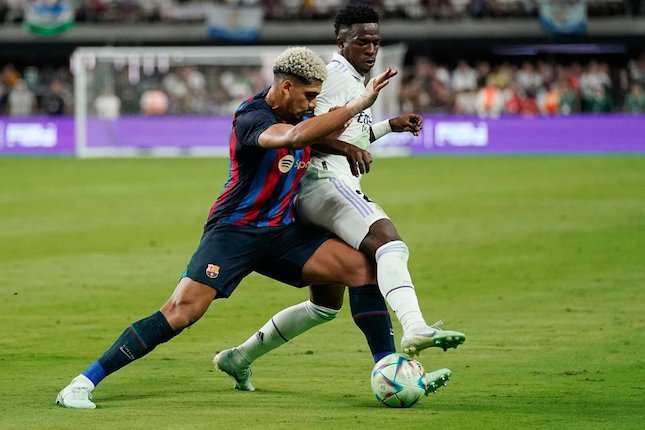 Duel El Clasico antara Real Madrid vs Barcelona di laga pramusim, Minggu (24/7/2022). (c) AP Photo