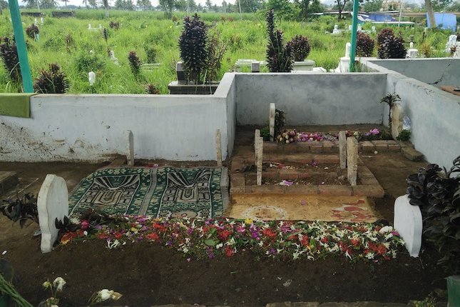 Makam Syahrulloh, korban tragedi Kanjuruhan (c) Bola.net/Dendy Gandakusumah