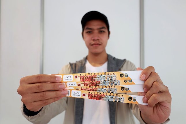 Senyum usai mendapat tiket