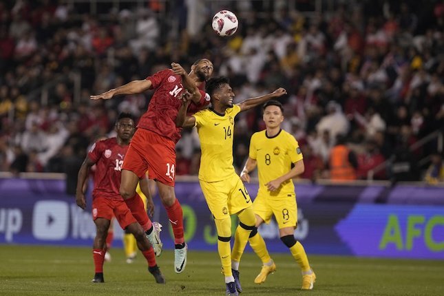 Jurnalis Malaysia Ikut Protes Piala Asia 2023: Pertandingan Bahrain vs Malaysia di matchday 2 Grup E (c) AP Photo/Thanassis Stavrakis