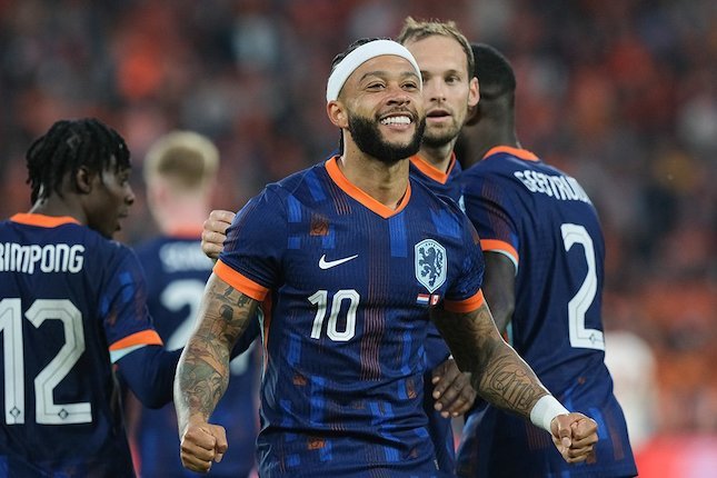 Momen selebrasi Memphis Depay usai cetak gol di laga Belanda vs Kanada, uji coba internasional Juni 2024 (c) AP Photo/Patrick Post